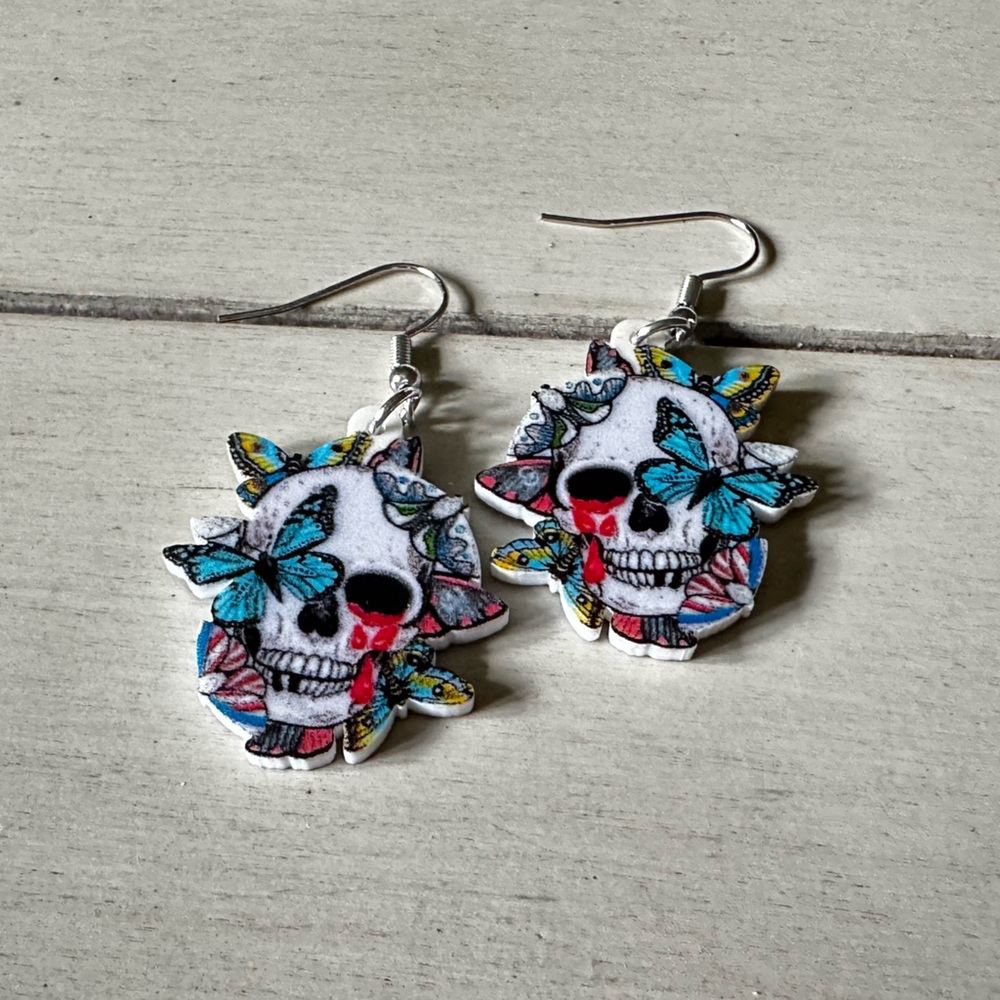 Skull and Buttferfly Earrings- Brand New